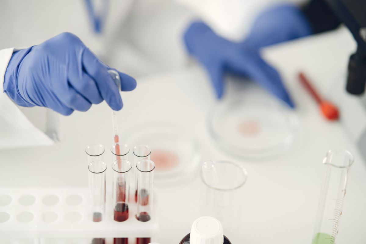 Lab technician analyzing a chemical sample for a Certificate of Analysis